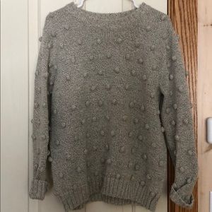 Clad and cloth all:row sweater with Pom Poms